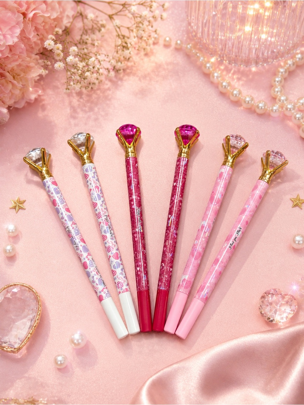 6 pink pens with a crystal diamond on top